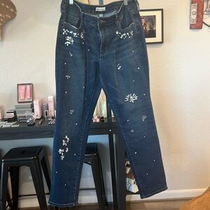 Size 14 jeans with bling stones on the front back of jeans is regular
